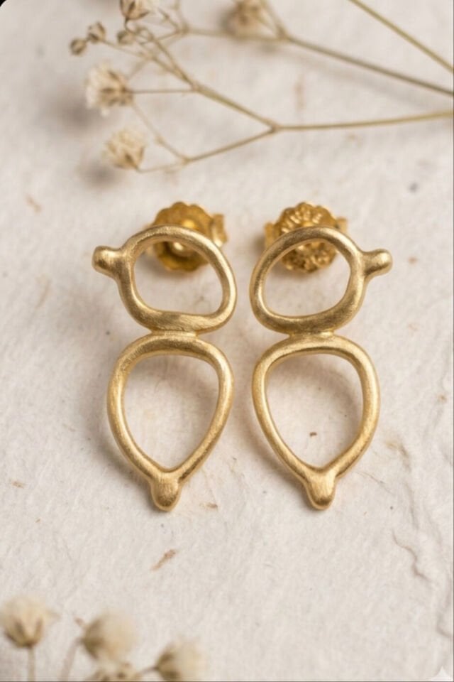 Altın kaplama iki Damla küpe